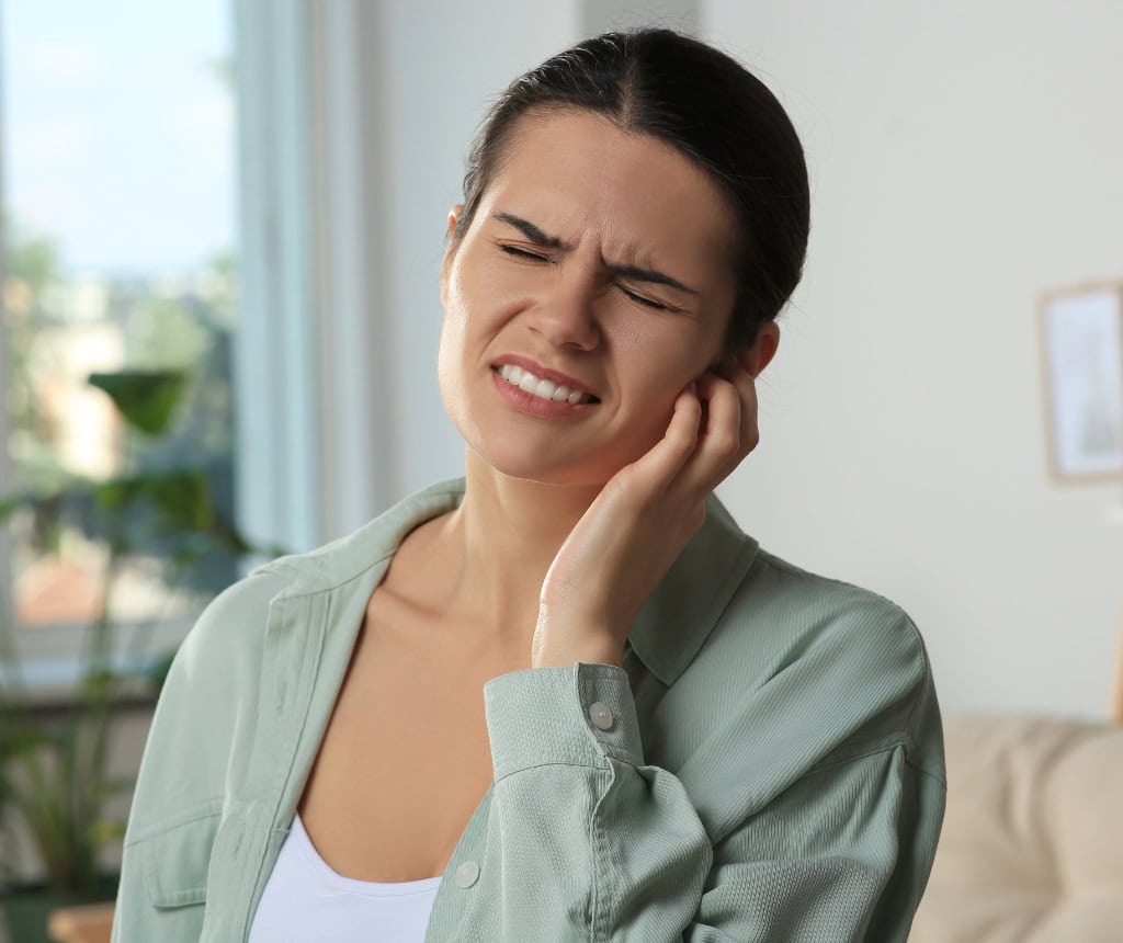 Paciente con dolor mandibular asociado a problemas de ATM